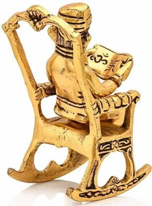 Golden Lord Ganesha Statue Sitting on a Rocking Chair and Reading Ramayan | Decorative Showpiece