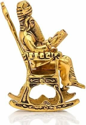 Golden Lord Ganesha Statue Sitting on a Rocking Chair and Reading Ramayan | Decorative Showpiece
